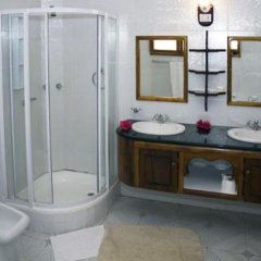 Апартаменты GT Self Catering Apartments Сейшельские острова, Остров Маэ - отзывы, цены и фото номеров - забронировать отель GT Self Catering Apartments онлайн ванная