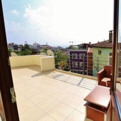 Апартаменты Camelot Apartment балкон