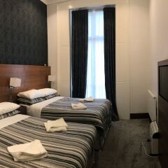 Отель Leisure Inn комната для гостей фото 4