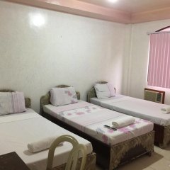 Отель OYO 426 Coco Grove Tourist Inn Филиппины, Дауис - отзывы, цены и фото номеров - забронировать отель OYO 426 Coco Grove Tourist Inn онлайн комната для гостей фото 2