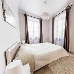 Апартаменты SutkiMinsk Apartment комната для гостей фото 2