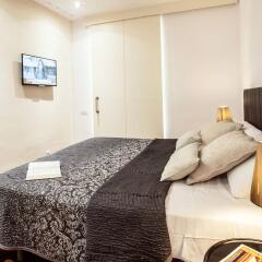 Апартаменты Paseo De Gracia Bas Apartments Barcelona Барселона комната для гостей фото 4