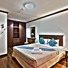Отель Victory Executive Residences Бангкок комната для гостей