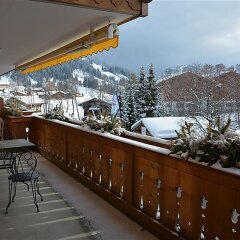 Отель Hahnenkamm - Three Bedroom Швейцария, Шёнрид - отзывы, цены и фото номеров - забронировать отель Hahnenkamm - Three Bedroom онлайн балкон