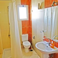 Апартаменты Villages Road Apartments ванная