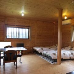 Отель Cottage Orange House Yakushima Якусима комната для гостей