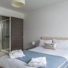 Апартаменты The Boardwalk Apartments комната для гостей