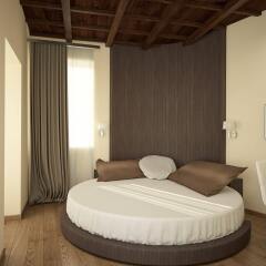 Отель Arenula Suites комната для гостей фото 2