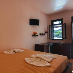 Отель Little Lindos Sea View Studios в номере