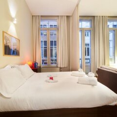 Отель Sweet Inn Apartments Brasseurs Бельгия, Брюссель - отзывы, цены и фото номеров - забронировать отель Sweet Inn Apartments Brasseurs онлайн комната для гостей