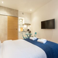 Отель Cosy flat Eiffel tower Франция, Париж - отзывы, цены и фото номеров - забронировать отель Cosy flat Eiffel tower онлайн комната для гостей фото 2