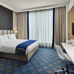 Отель Holiday Inn Express Katong комната для гостей фото 5