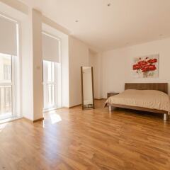 Отель Charming Seafront Apartment, Perfect for Families Мальта, Слима - отзывы, цены и фото номеров - забронировать отель Charming Seafront Apartment, Perfect for Families онлайн комната для гостей фото 2