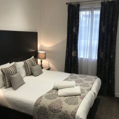 Апартаменты Fountain Court Apartments - Grove комната для гостей фото 5