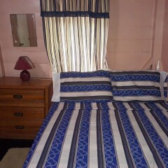 Отель Sandune Cottage Треже-Бич комната для гостей