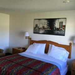 Отель 99 Palms Inn & Suites комната для гостей фото 3