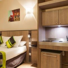 Отель Comfort Suites Rive Gauche Lyon Centre Франция, Лион - отзывы, цены и фото номеров - забронировать отель Comfort Suites Rive Gauche Lyon Centre онлайн комната для гостей фото 4