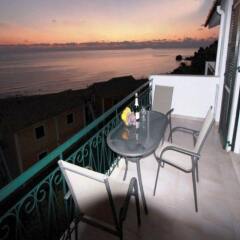 Отель Corfu Glyfada Menigos Resort балкон