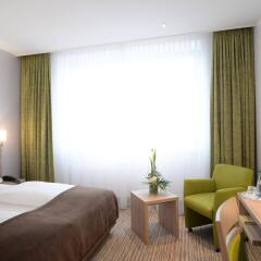 Отель Ringhotel Loew's Merkur Германия, Нюрнберг - отзывы, цены и фото номеров - забронировать отель Ringhotel Loew's Merkur онлайн комната для гостей фото 5
