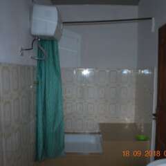 Отель HighLander Guest House ванная