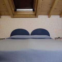 Отель Residence Antico Crotto Порлецца комната для гостей фото 5