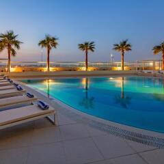 Отель Adagio Premium Dubai Al Barsha бассейн фото 2