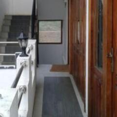 Отель Yoho Grand Drive Guest House балкон