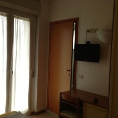 Hotel Apogeo удобства в номере