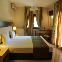 Meliton Inn Hotel & Suites Ситония комната для гостей