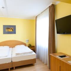Отель Parkhotel im Lehel Германия, Мюнхен - 1 отзыв об отеле, цены и фото номеров - забронировать отель Parkhotel im Lehel онлайн удобства в номере фото 2