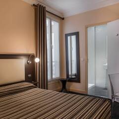 Отель Grand Hotel Leveque Франция, Париж - 4 отзыва об отеле, цены и фото номеров - забронировать отель Grand Hotel Leveque онлайн комната для гостей фото 2
