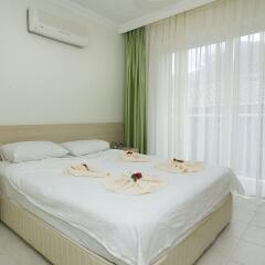 Апартаменты Orka Center Point Apartments Олудениз комната для гостей фото 2
