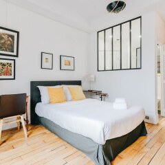 Отель Eiffel Tower - Ecole Militaire Apartment Франция, Париж - отзывы, цены и фото номеров - забронировать отель Eiffel Tower - Ecole Militaire Apartment онлайн комната для гостей фото 5