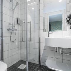 Отель Thon Hotel Nidaros Норвегия, Тронхейм - отзывы, цены и фото номеров - забронировать отель Thon Hotel Nidaros онлайн ванная фото 2