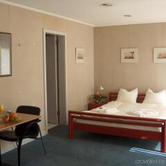 Отель EMA House Hotel Suites Швейцария, Цюрих - отзывы, цены и фото номеров - забронировать отель EMA House Hotel Suites онлайн комната для гостей