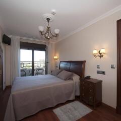 Отель Pensión Residencia A Cruzán - Adults Only комната для гостей фото 5