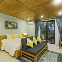 Отель De Campagne Villa Hoi An комната для гостей