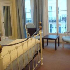 Отель Cross Street Guesthouse комната для гостей