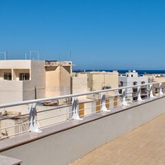 Отель First Class Apartments Ta Martin by G&G Мальта, Буджибба - отзывы, цены и фото номеров - забронировать отель First Class Apartments Ta Martin by G&G онлайн балкон