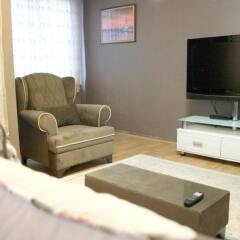 Апартаменты Expo Mg Apartments сейф в номере