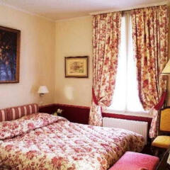 Отель Hôtel Exelmans сейф в номере