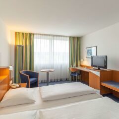 Отель Ramada by Wyndham Hannover Германия, Ганновер - отзывы, цены и фото номеров - забронировать отель Ramada by Wyndham Hannover онлайн комната для гостей фото 7
