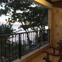 Отель Dumaluan Beach Resort Филиппины, Калапе - отзывы, цены и фото номеров - забронировать отель Dumaluan Beach Resort онлайн балкон