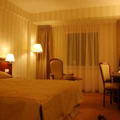Ramada Hotel & Suites Bucharest North комната для гостей