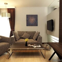 Отель Sukhumvit Suites Бангкок комната для гостей фото 5