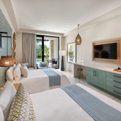 Отель Unique Club at Lopesan Costa Bávaro - All Inclusive Доминикана, Пунта Кана - отзывы, цены и фото номеров - забронировать отель Unique Club at Lopesan Costa Bávaro - All Inclusive онлайн комната для гостей фото 5