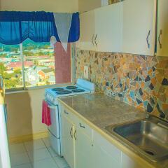 Апартаменты Sky Blue Beach Studio at Turtle Tower в номере