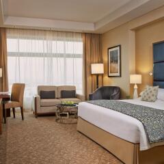Отель Al Ghurair Rayhaan by Rotana Стандартный номер с различными типами кроватей