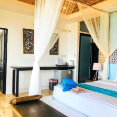 Отель Aminjirah Resort Таиланд, Остров Тау - отзывы, цены и фото номеров - забронировать отель Aminjirah Resort онлайн удобства в номере