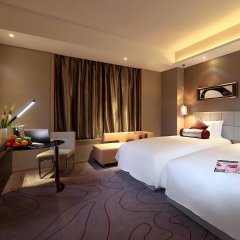 Отель Grand Mercure Jinan Sunshine Китай, Цзинань - отзывы, цены и фото номеров - забронировать отель Grand Mercure Jinan Sunshine онлайн комната для гостей фото 2
